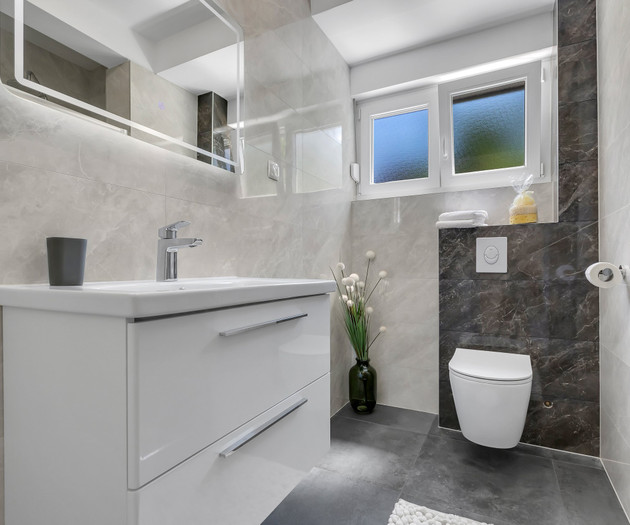 Modern bathroom with toilet sink