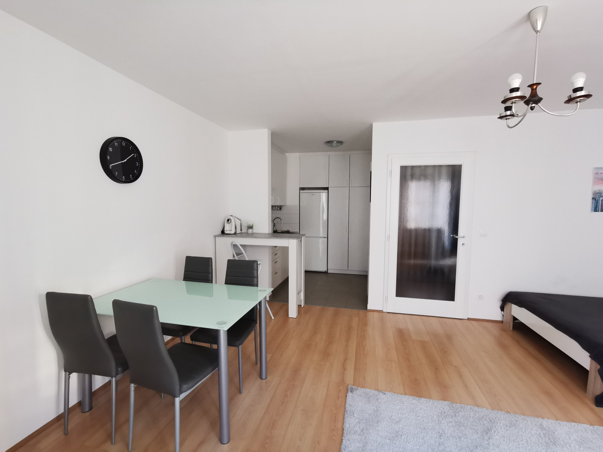 Living room with dining table and kitchen
