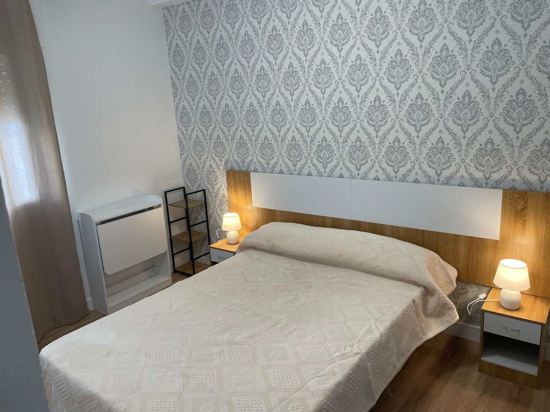 Bright bedroom with double bed