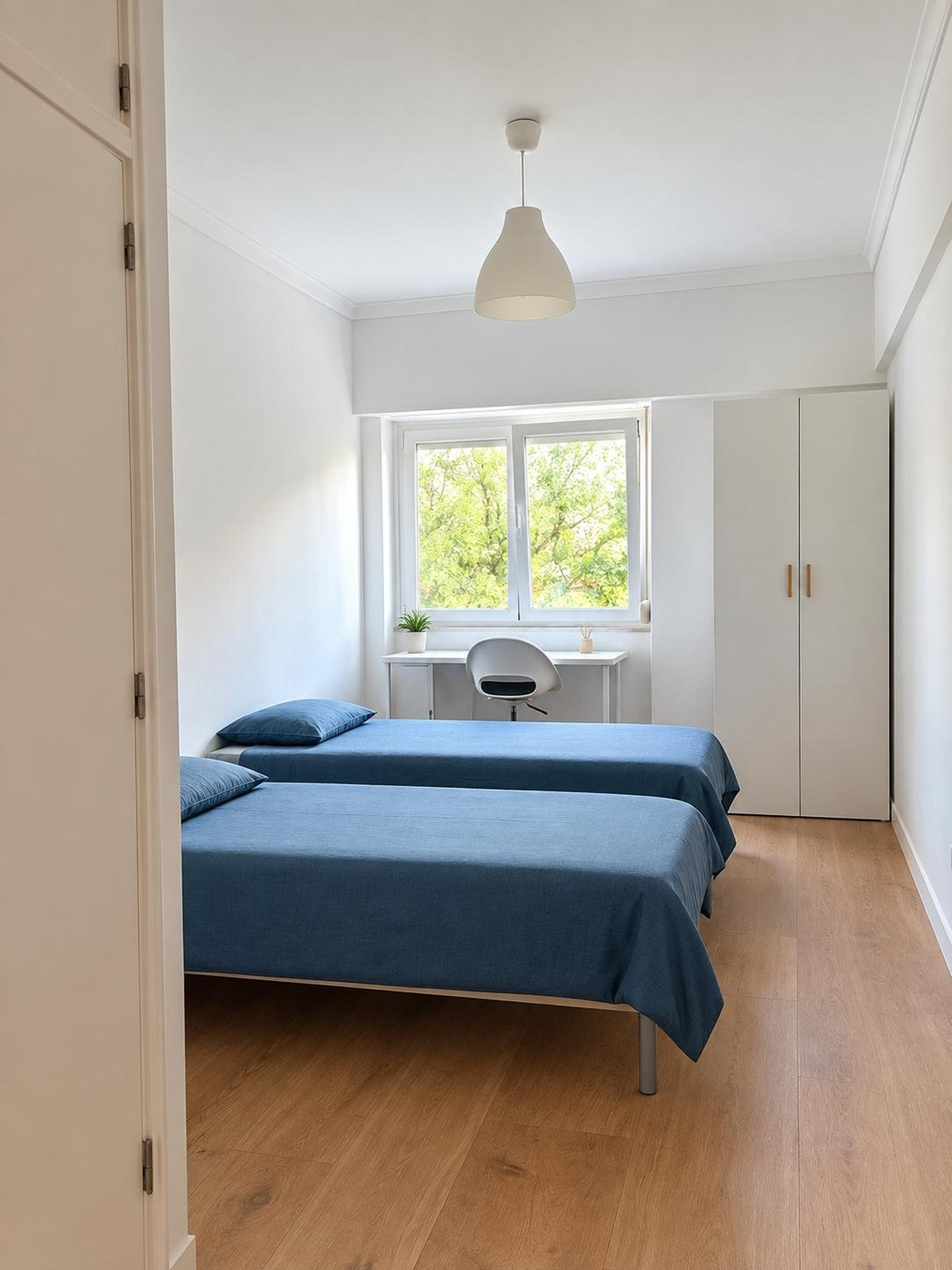 Twin bedroom with study desk