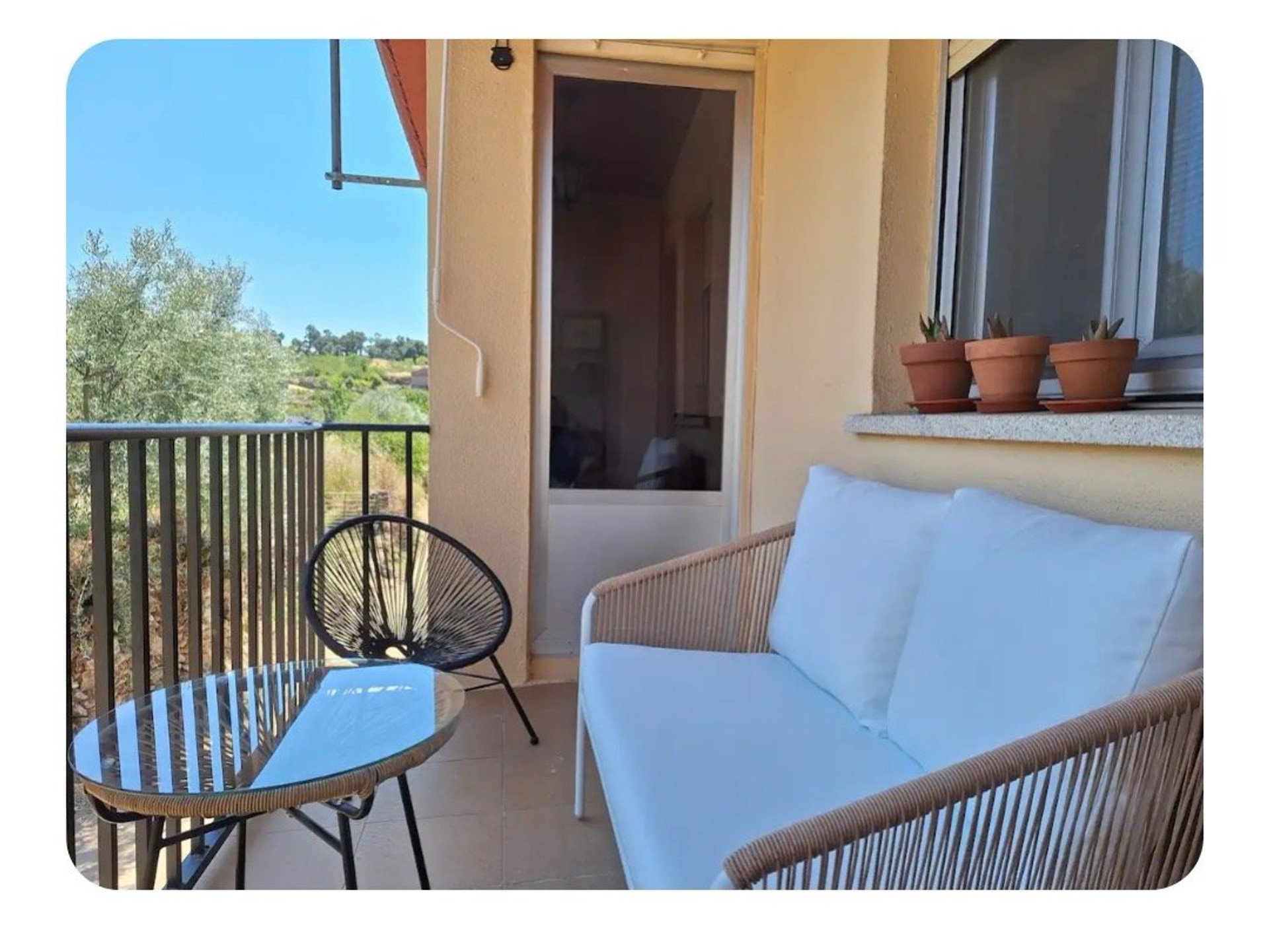 Balcony with lounge chairs