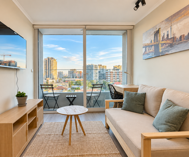 Living room with sofa and balcony
