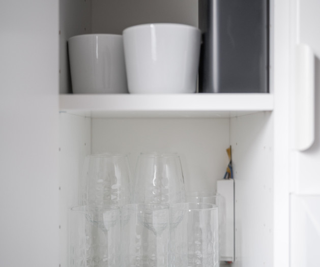 Cabinet with glasses and containers