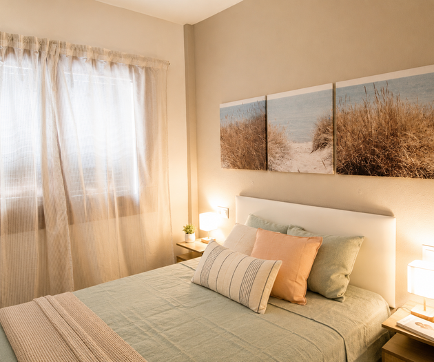 Bedroom with beach art