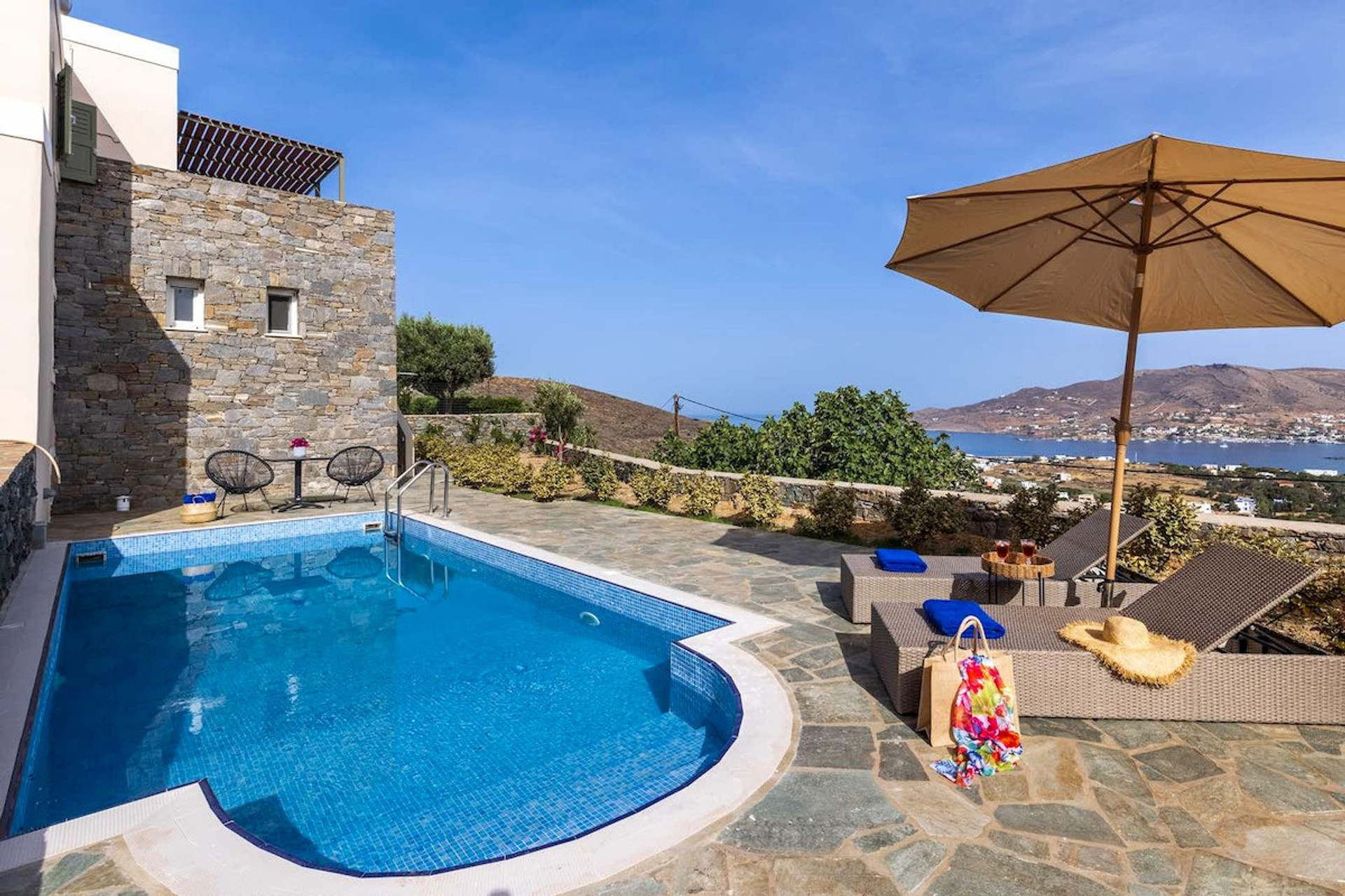 Dip into bliss! Private pool, sun loungers, & endless sea views. Luxury villa escape with ultimate relaxation. Your Greek paradise awaits.