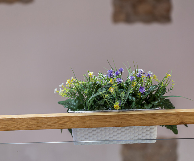 Flower planter on railing