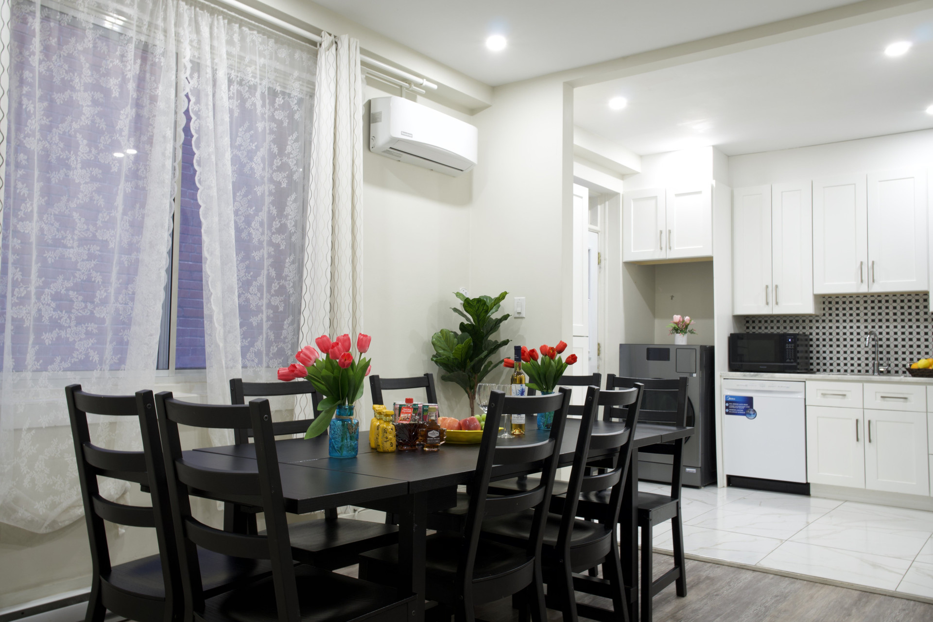 Dining table open to kitchen