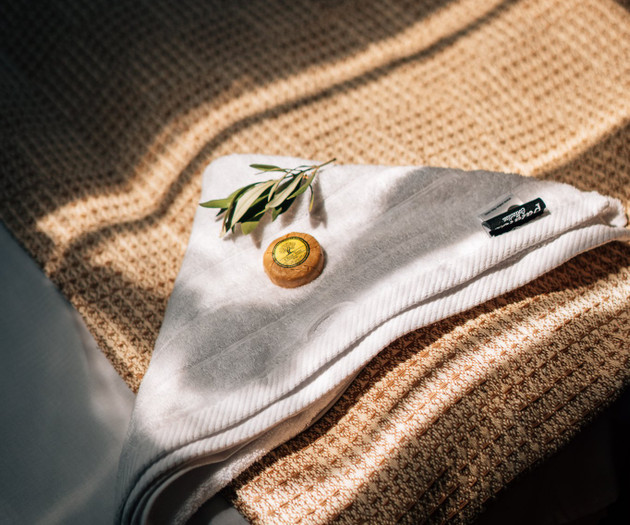 Folded towel with soap detail