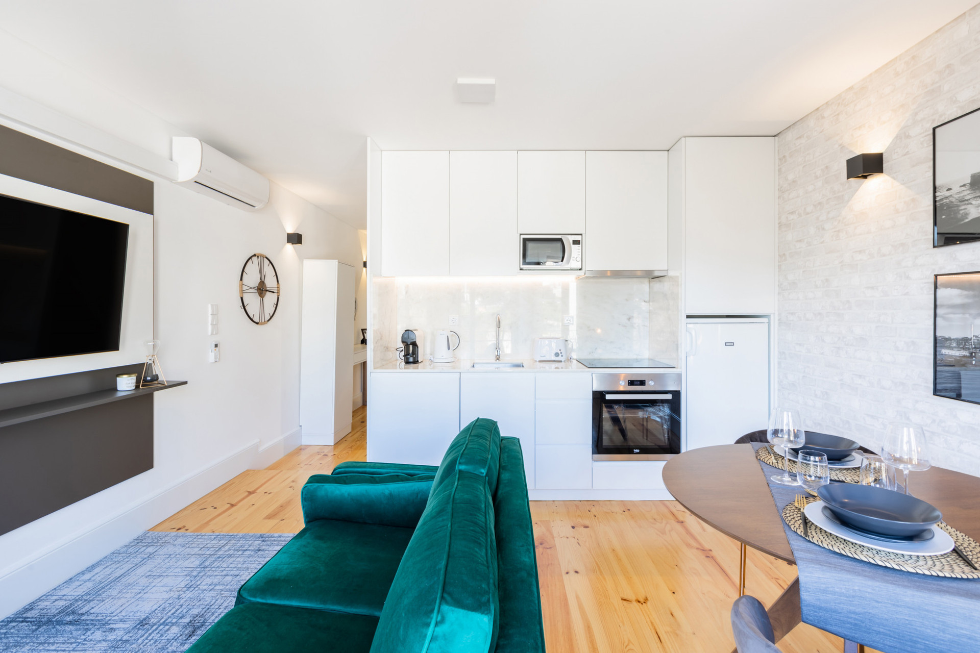 Living Room / Kitchenette with Flat-Screen TV and Dining Area