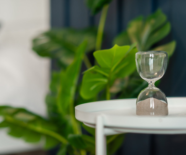 Hourglass decor on side table