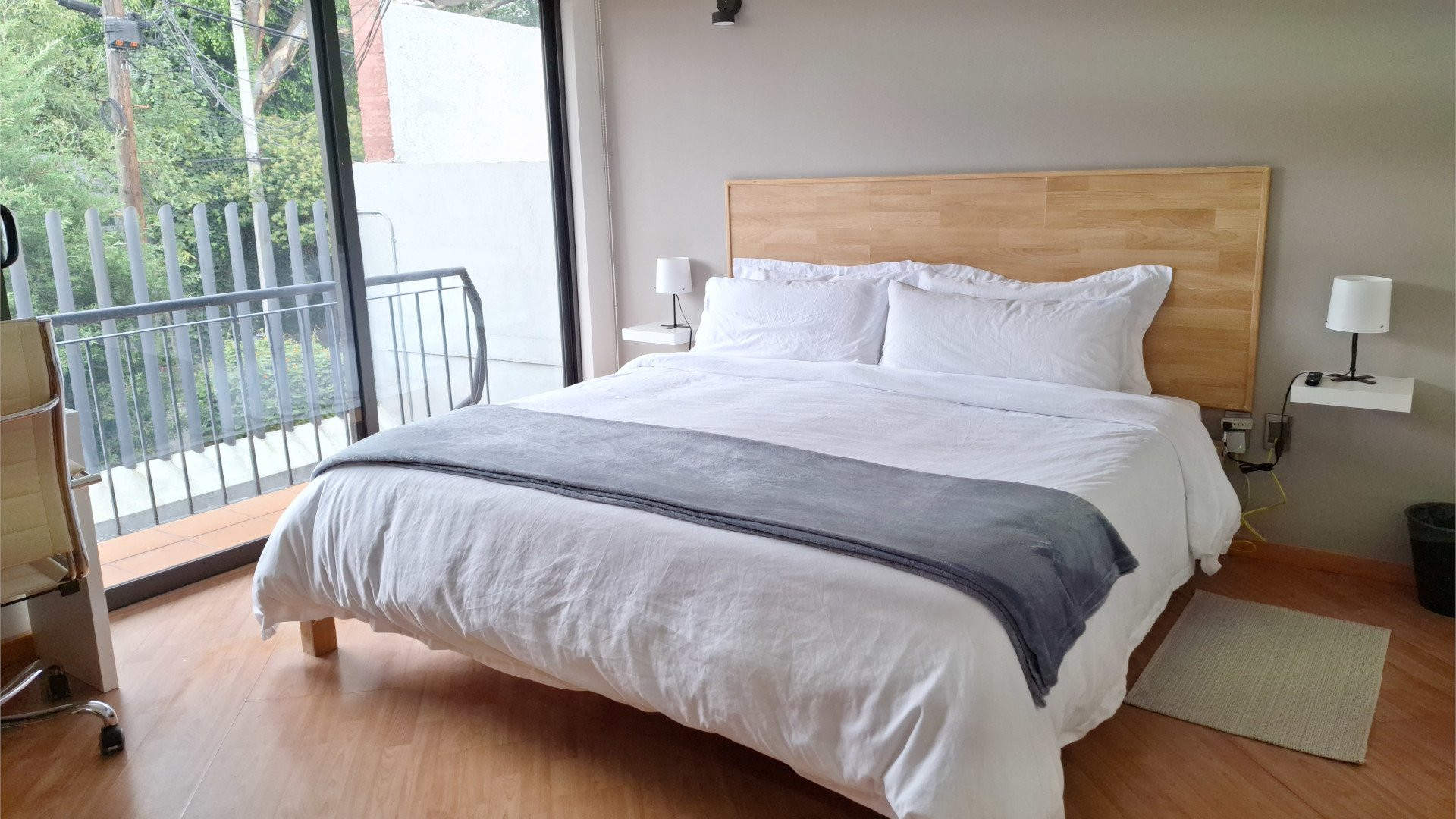 Bright bedroom with king bed