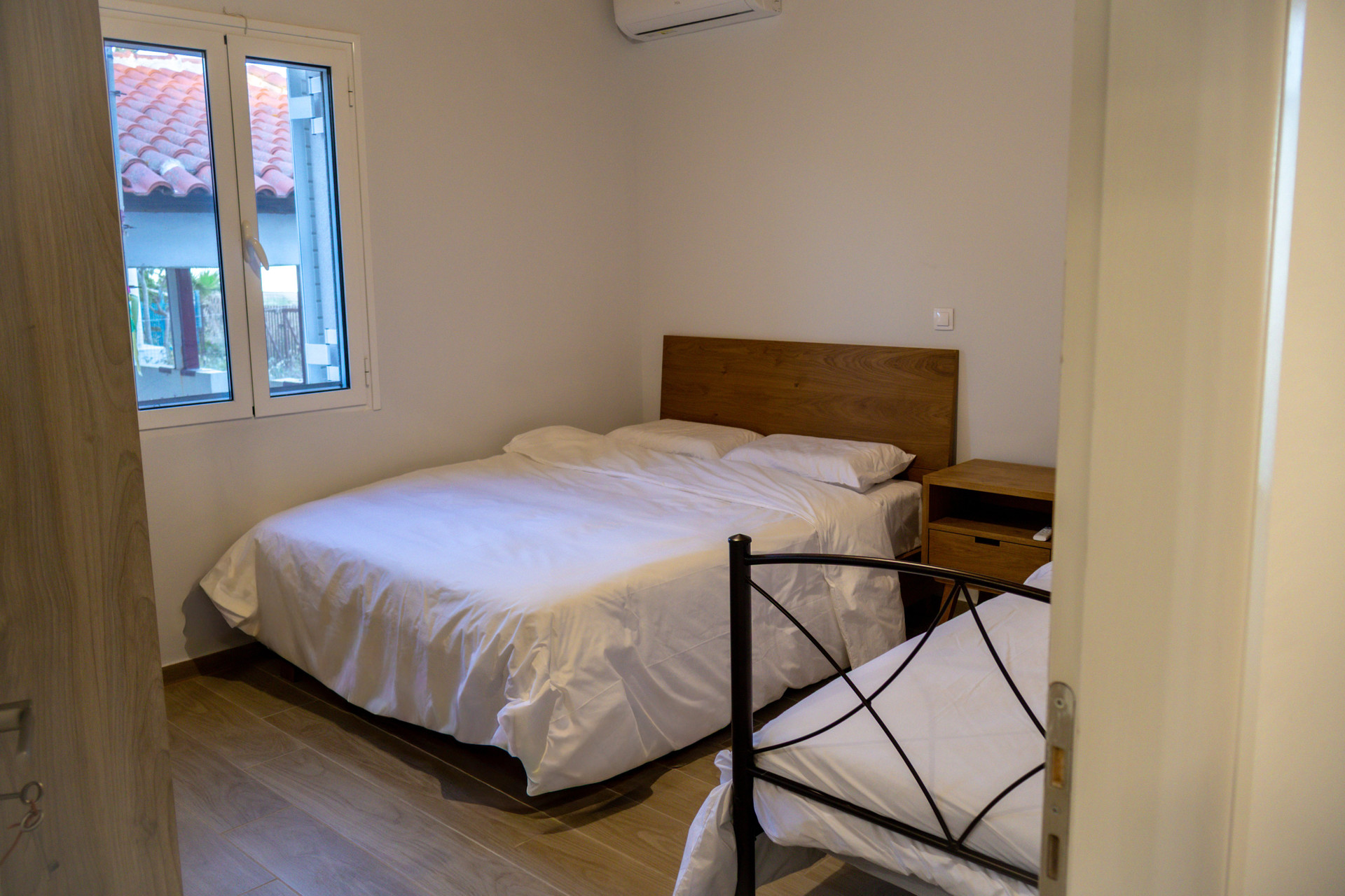 Bedroom with double and single bed