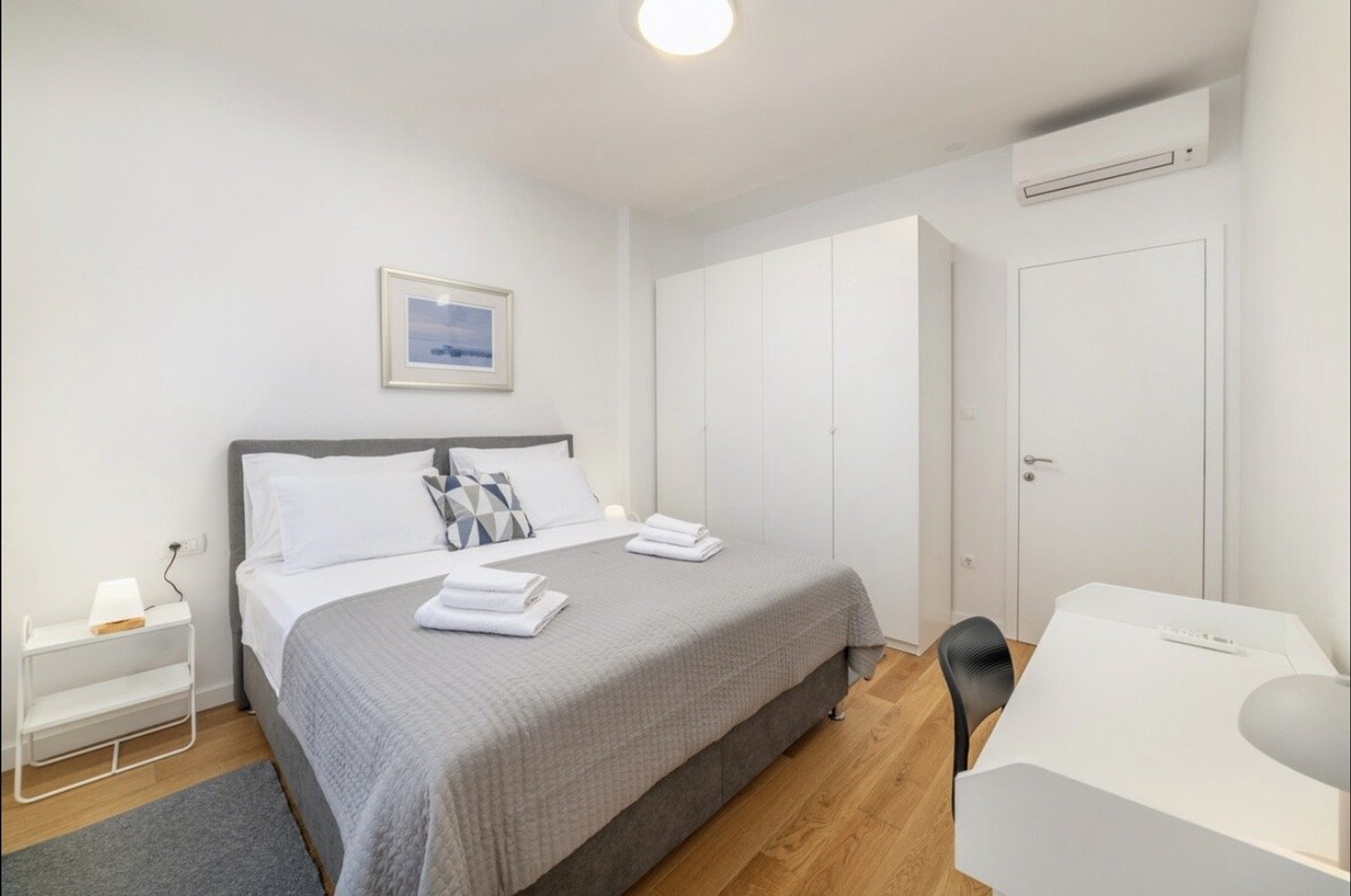 Bedroom with wardrobe and desk