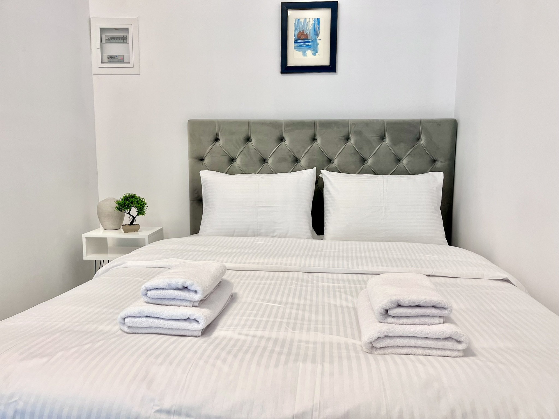 Bed with folded towels
