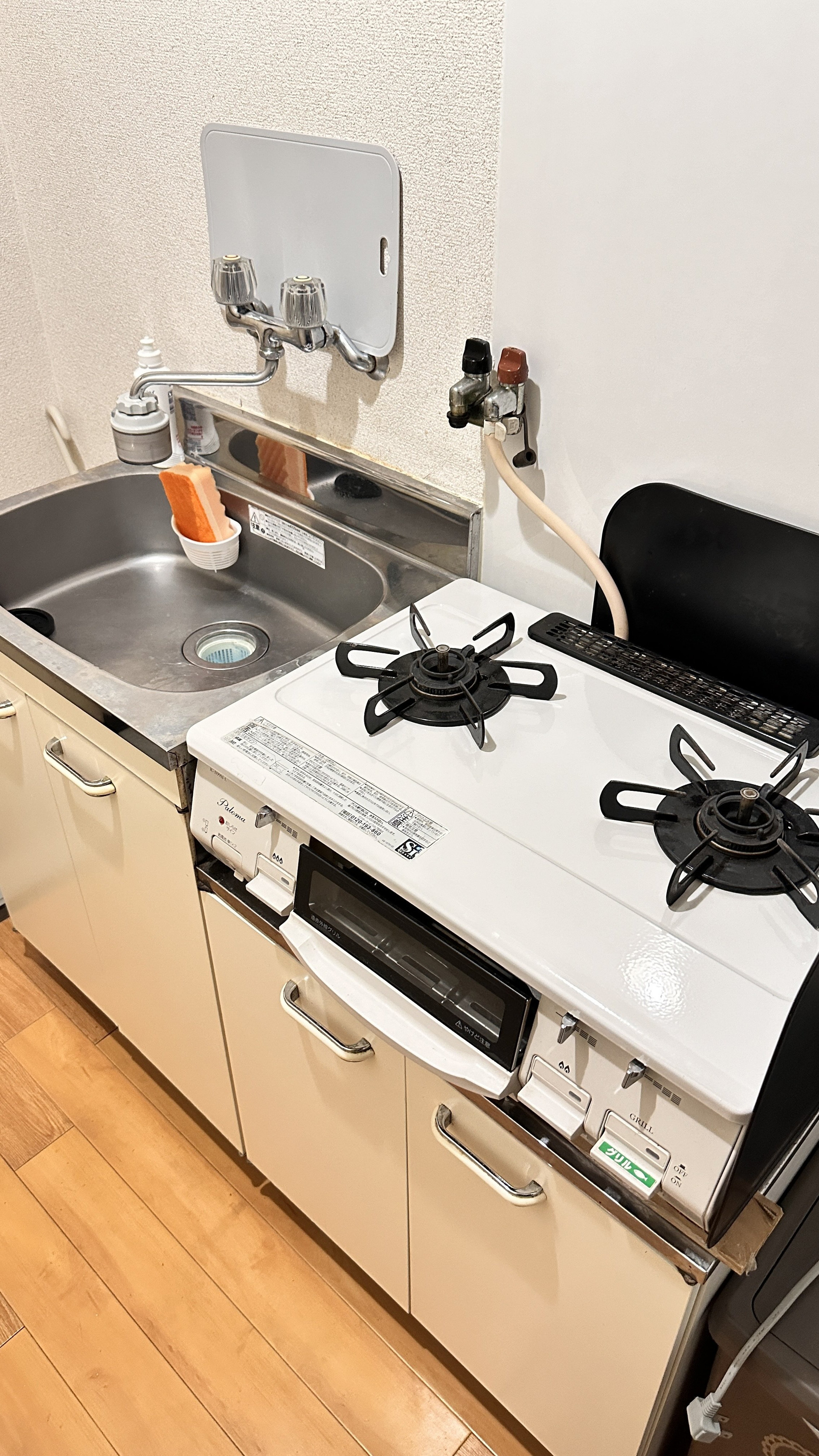 Kitchen sink and stove view