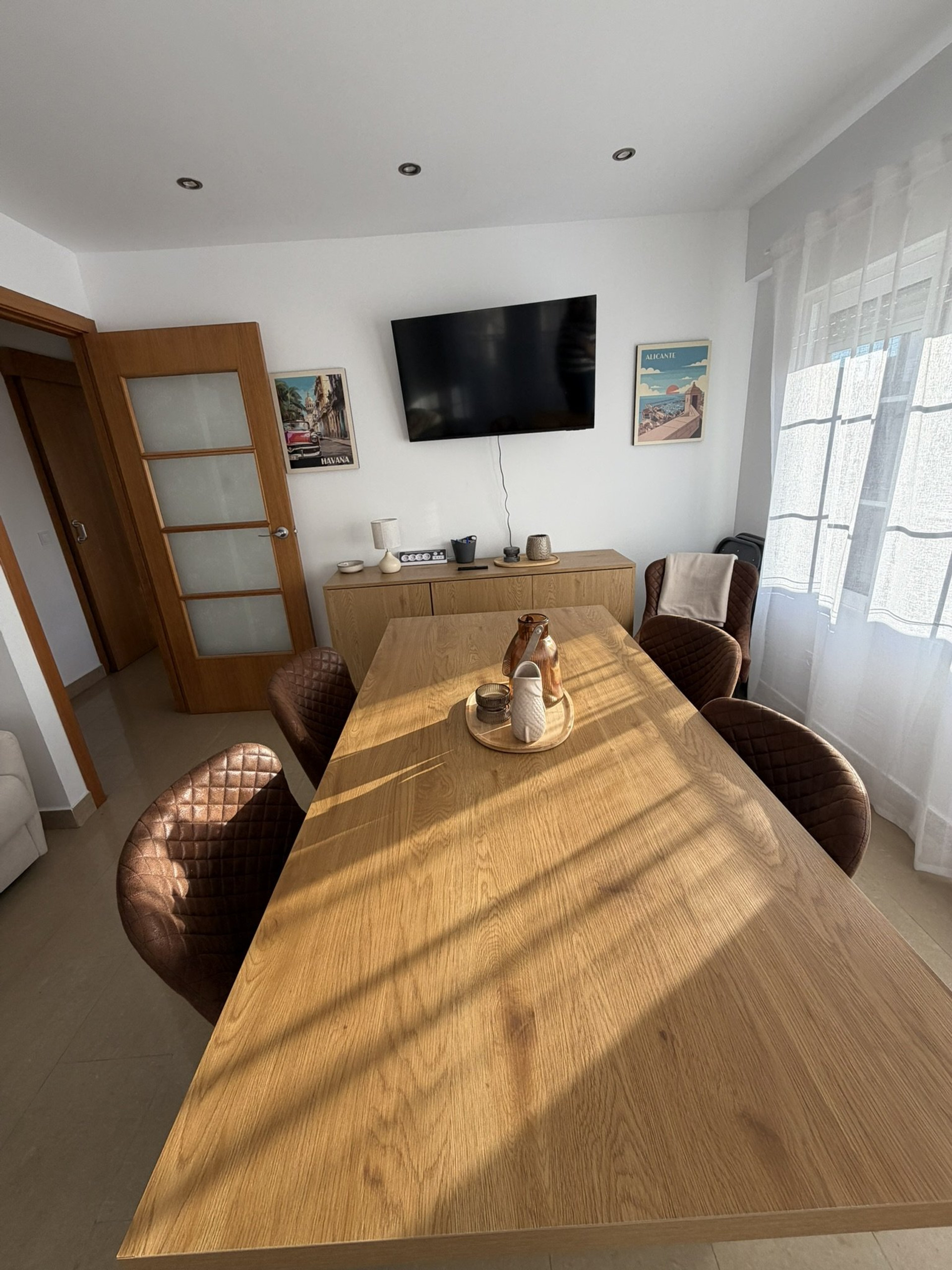 Dining room with TV and decor