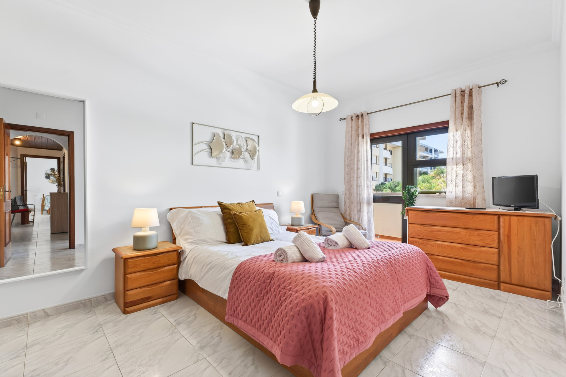 Master bedroom with balcony access
