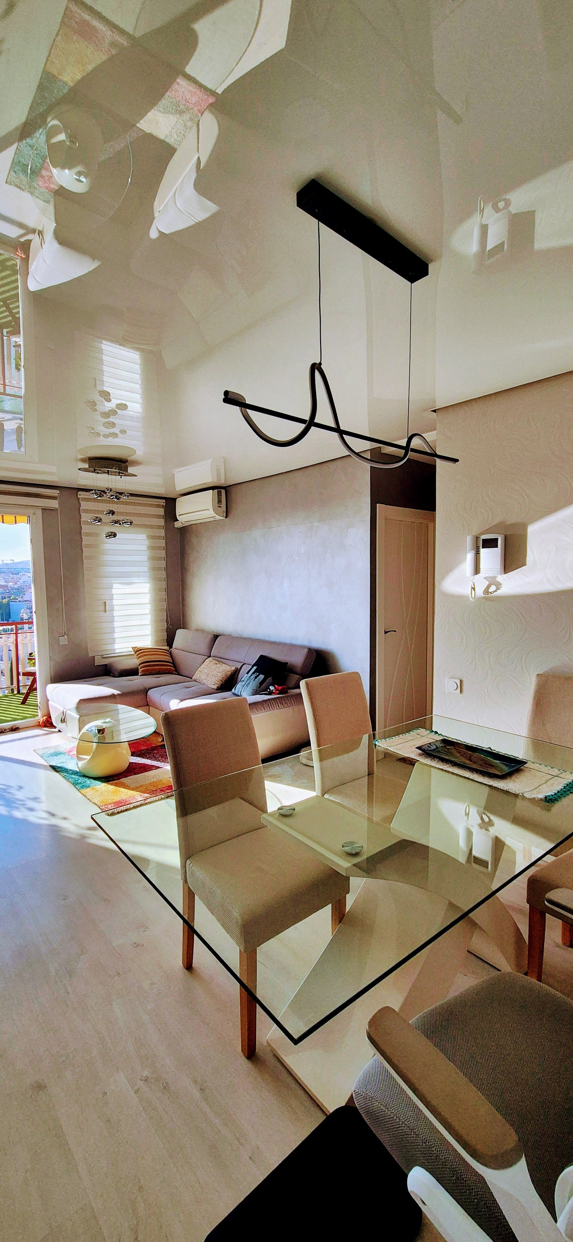 Living area with glass dining table