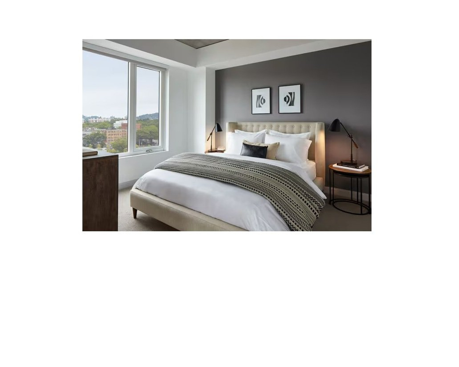 Bedroom with city view window