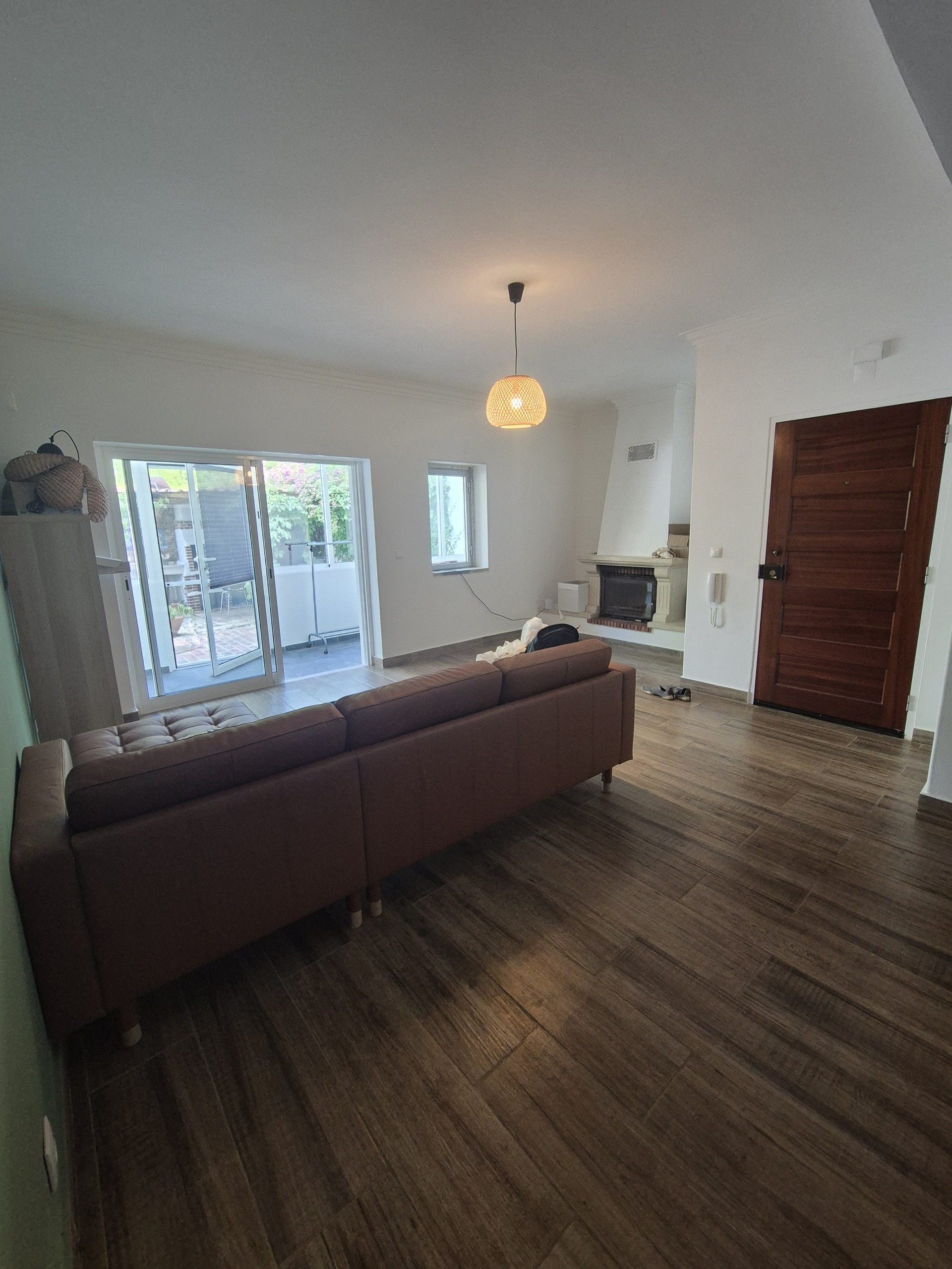 Living room with sofa fireplace