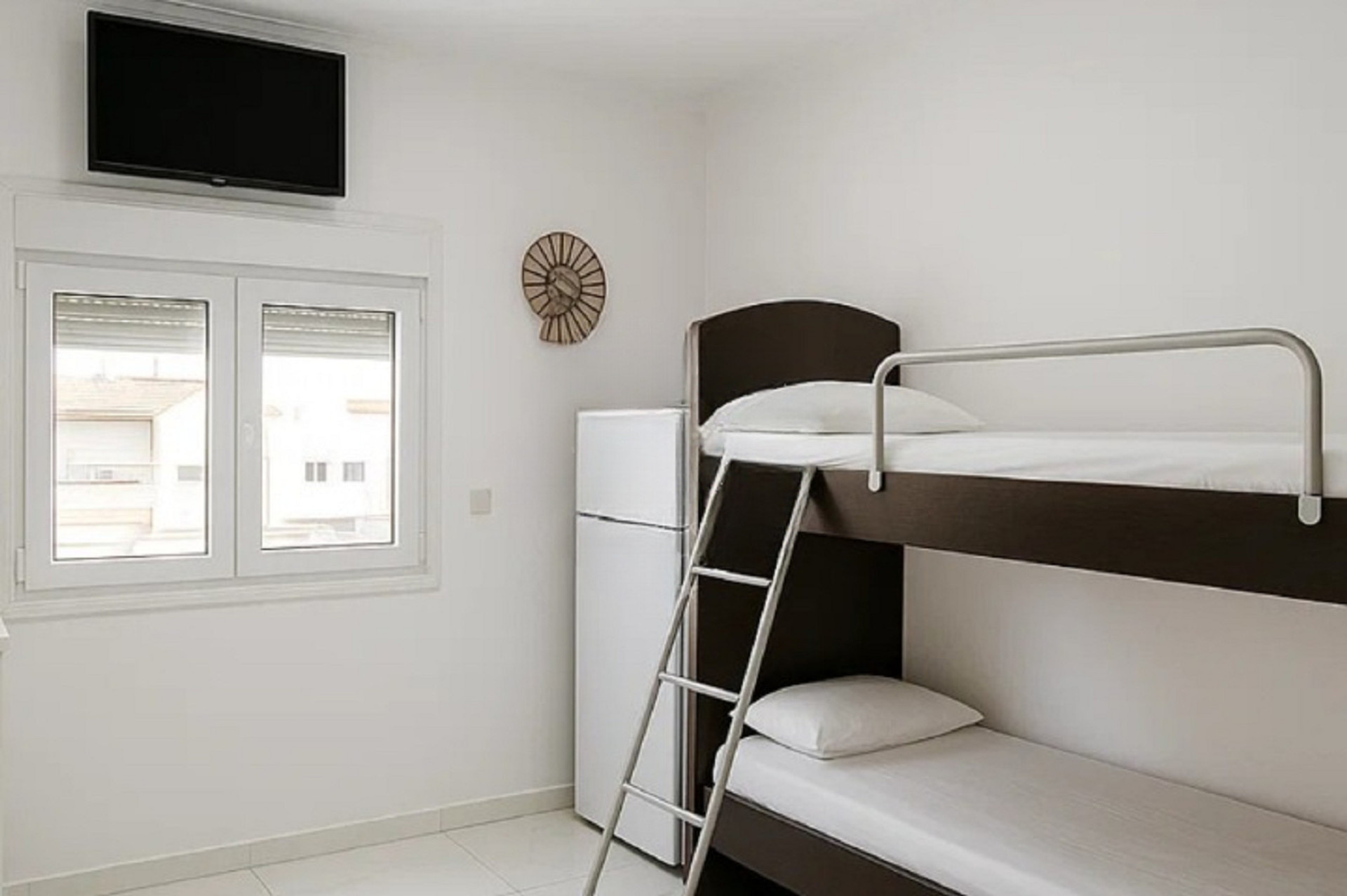 Perfect for families! Fun and sturdy bunk beds in a bright, clean room for your little ones