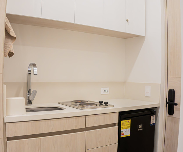 Compact kitchenette with mini fridge
