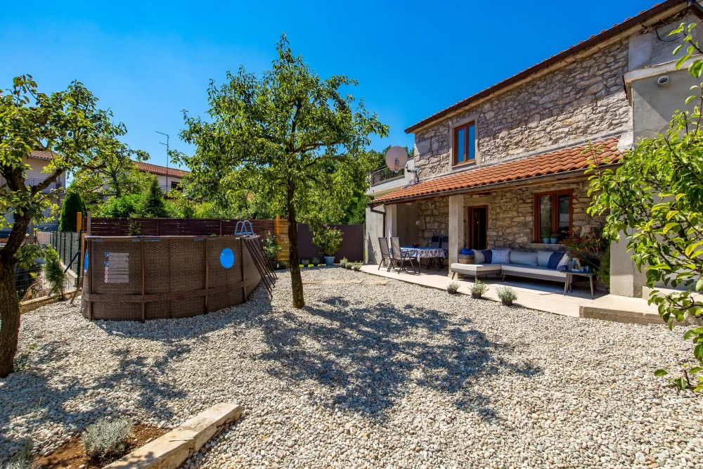 Cozy stone house in a small village preview