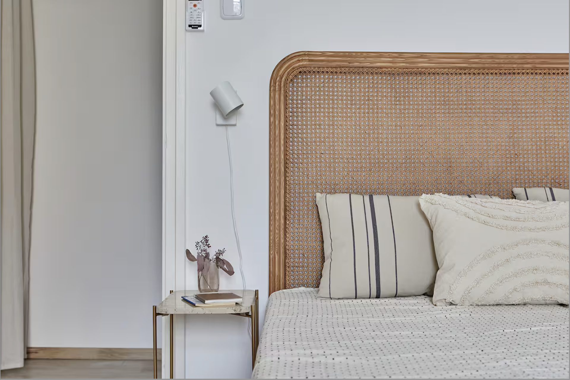 Close-up rattan headboard and nightstand