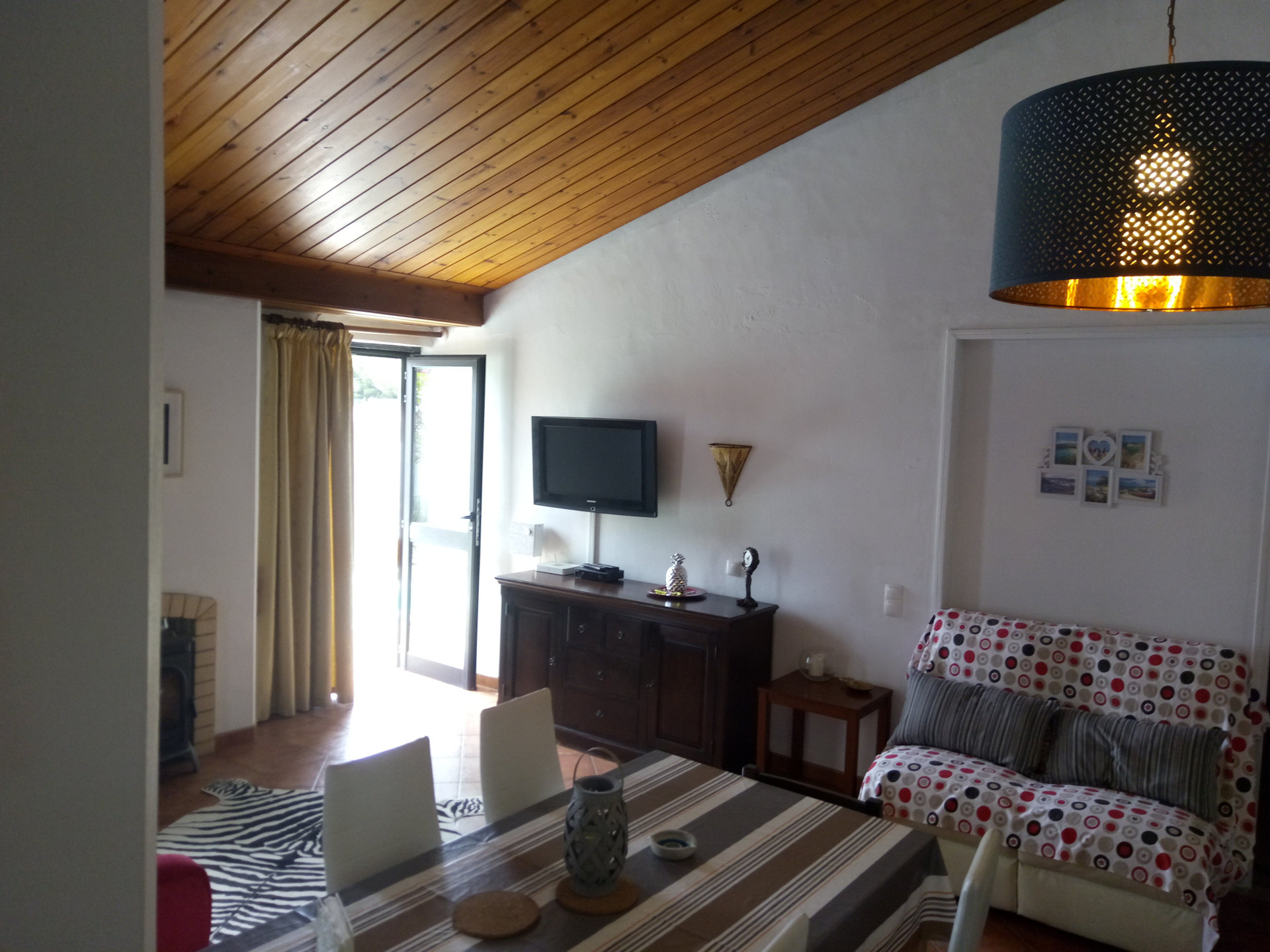 Living room TV wooden ceiling