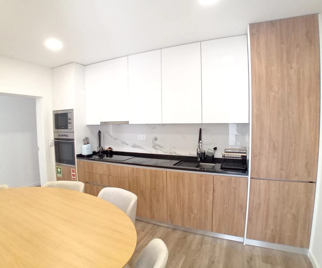 Kitchen with wood cabinetry