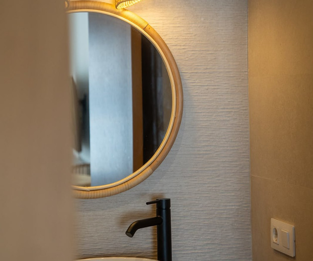 Bathroom vanity mirror detail