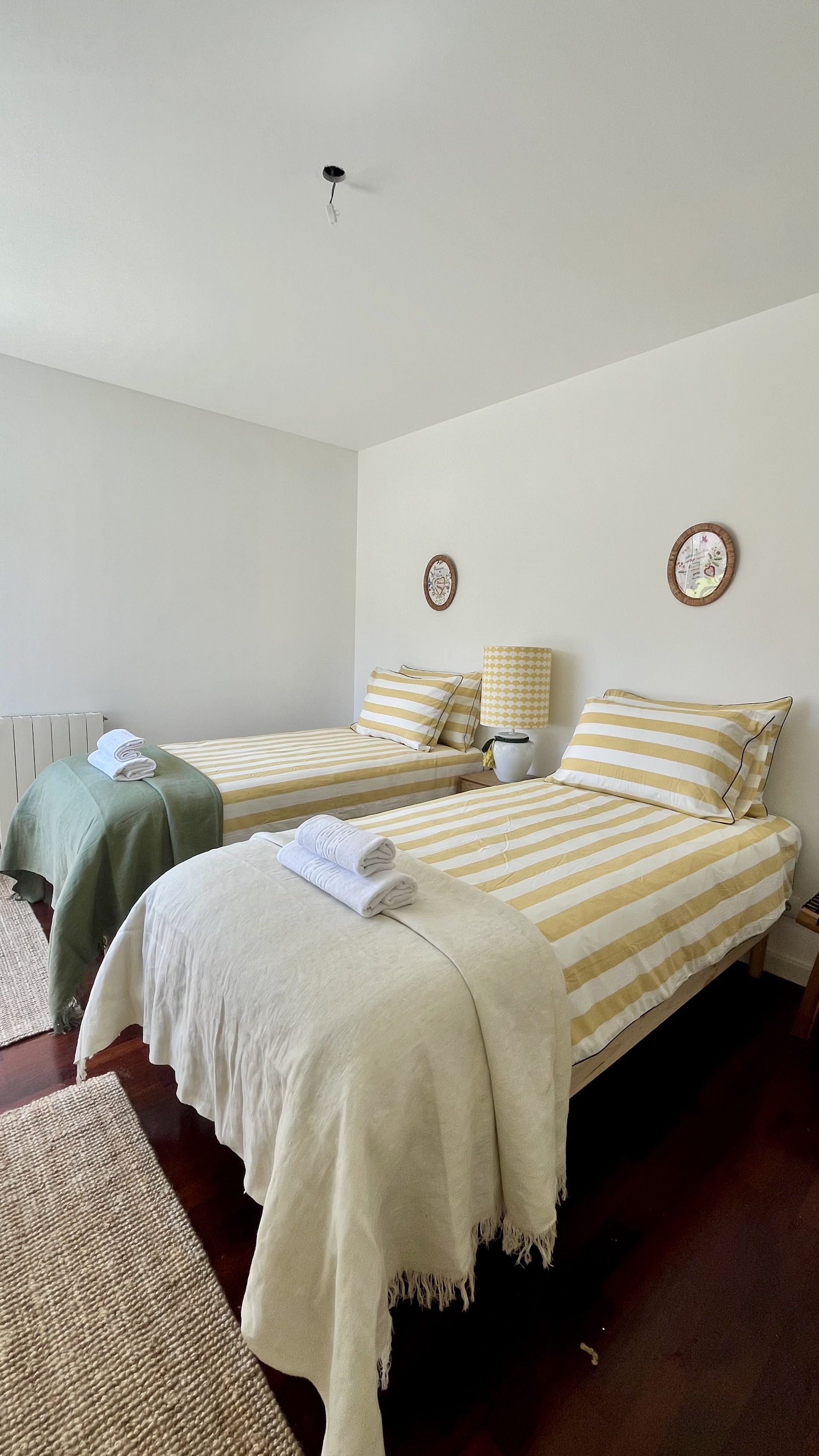 Twin beds with cozy linens