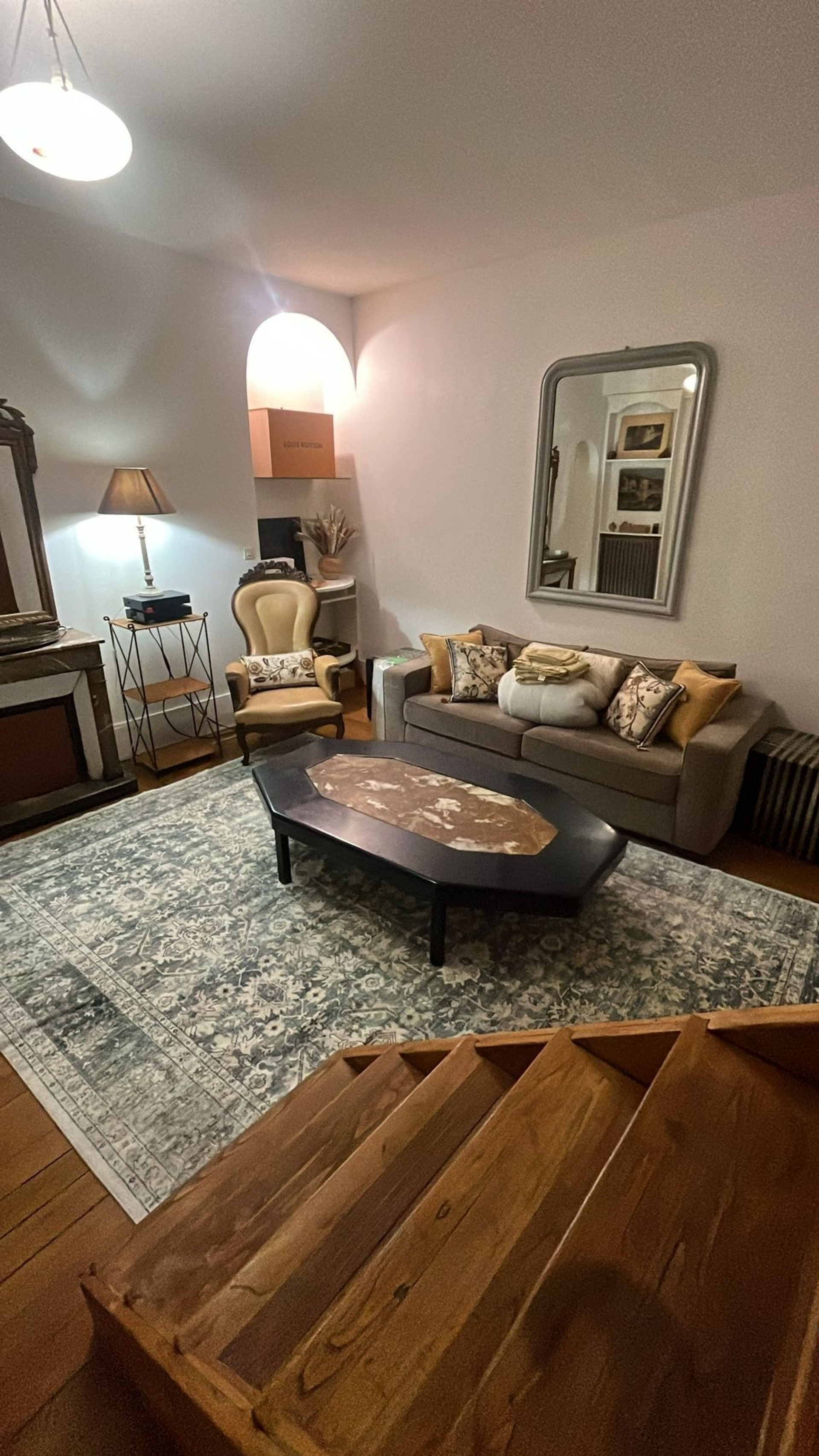 Living room with sofa and mirror