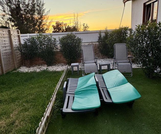 Garden loungers at sunset