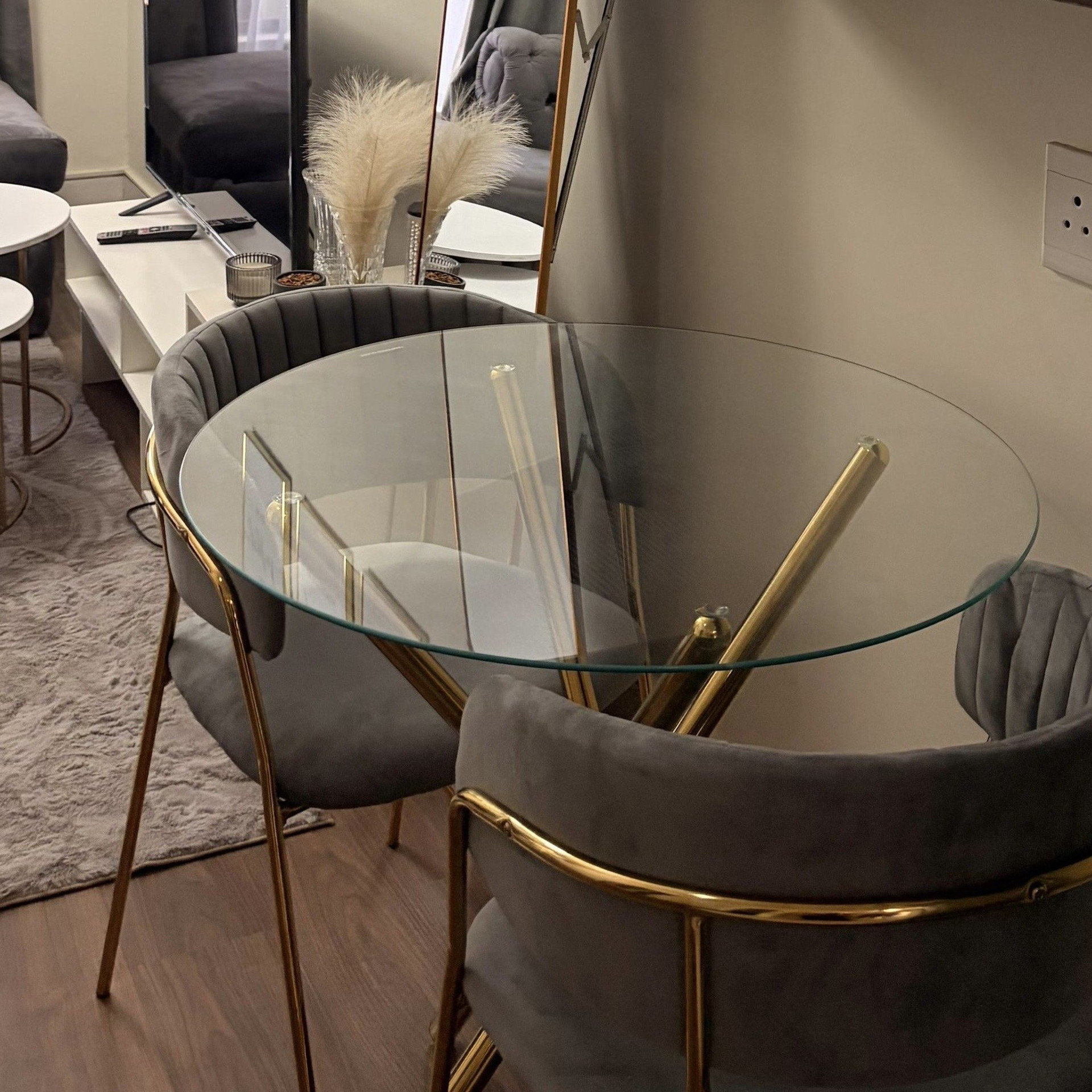 Glass dining table with chairs
