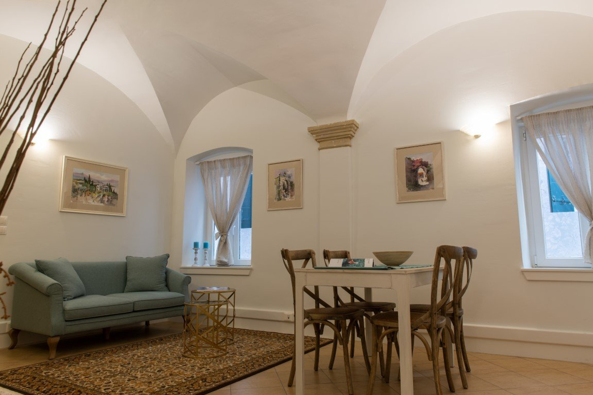 Living room with sofa and dining table