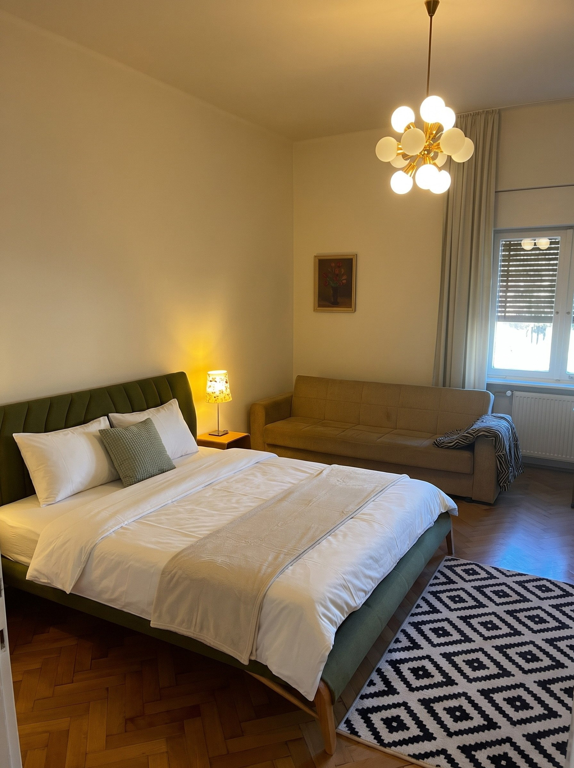 Bedroom with green upholstered bed