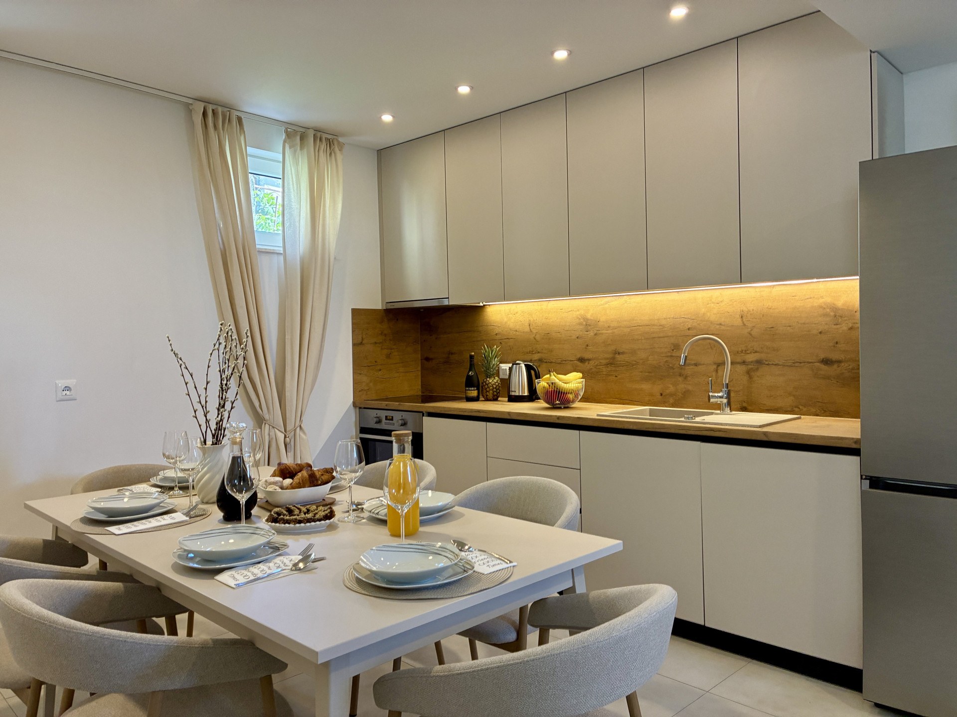 Modern kitchen with dining table set