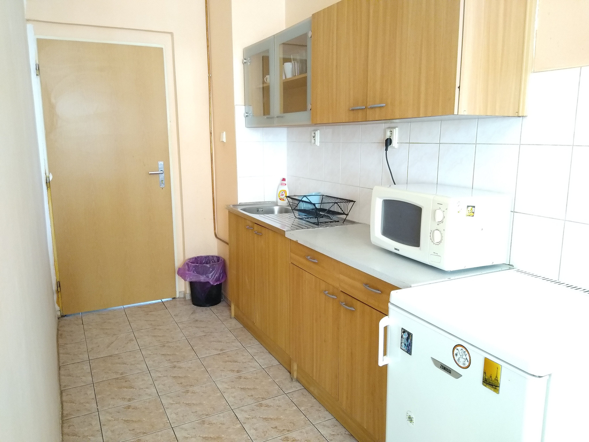 The kitchen is a bit old but it still works. 