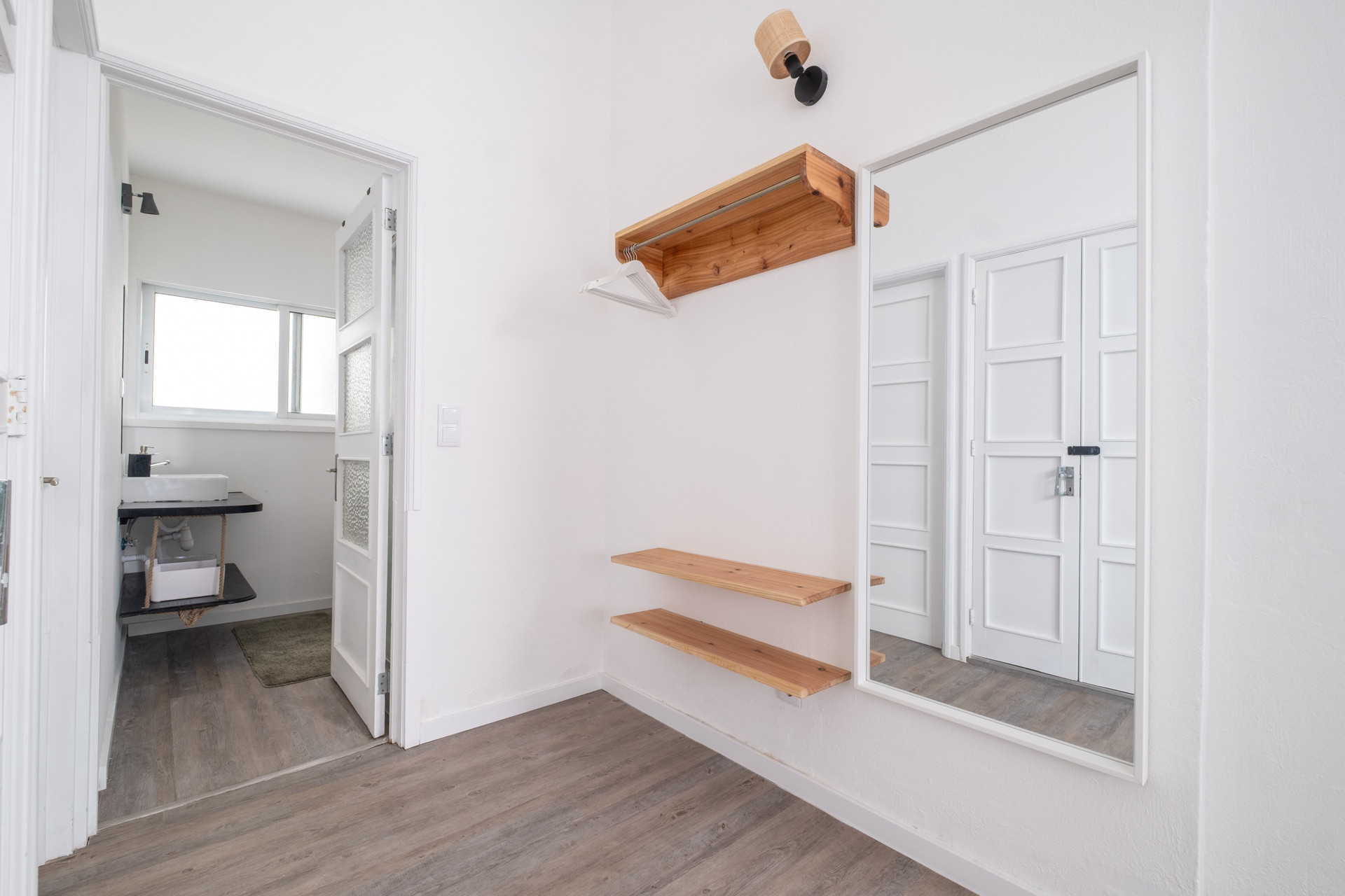 Hallway leading to bathroom