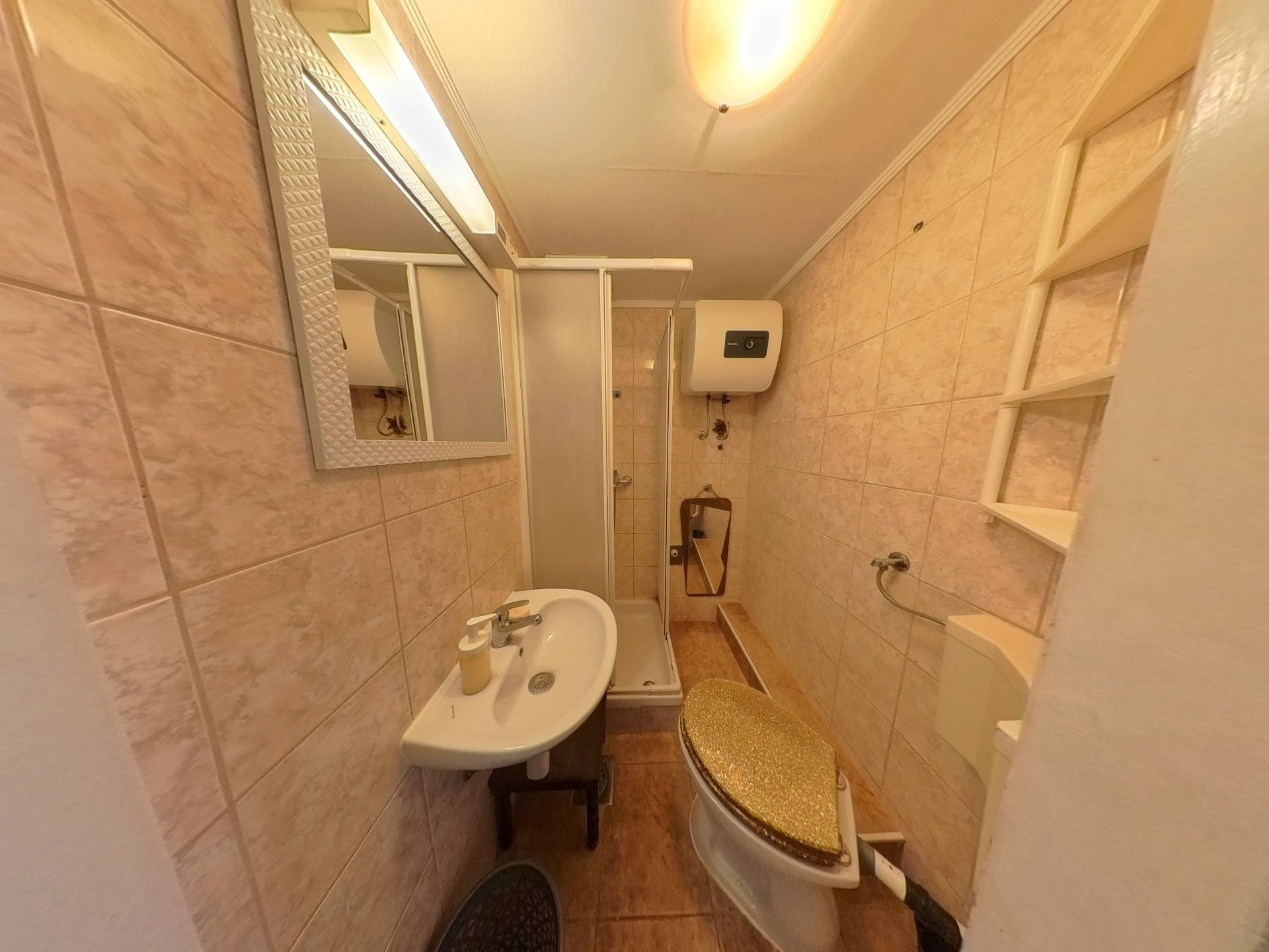 A bathroom with a shower