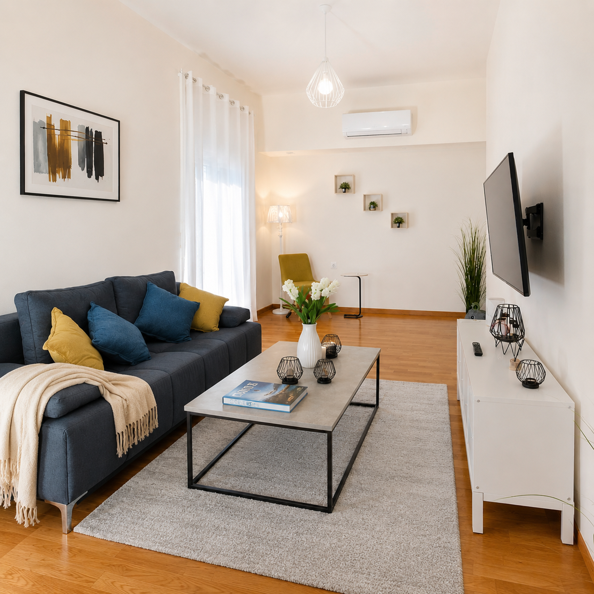 Bright living room with sofa TV