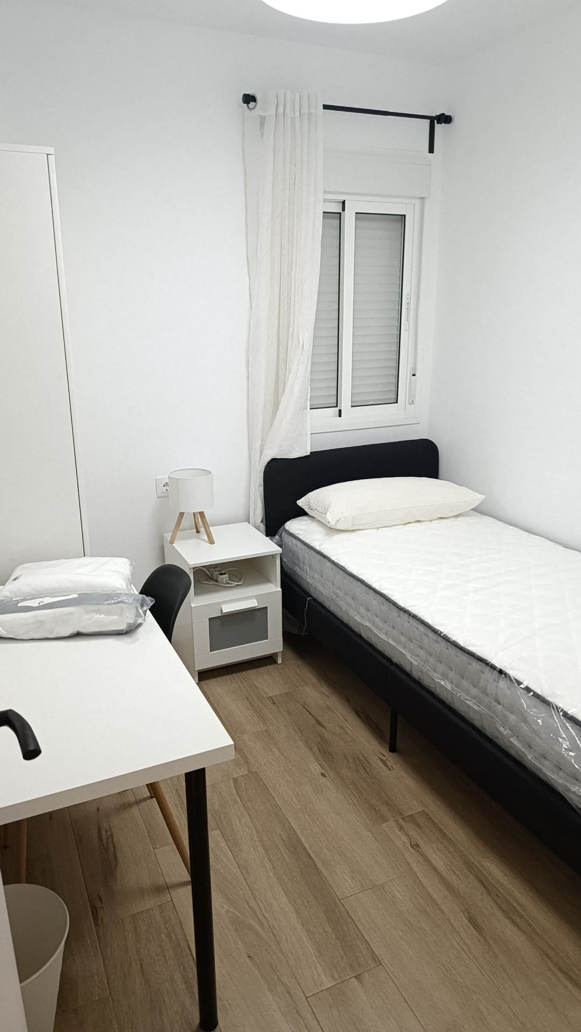 Bedroom with wardrobe and nightstand