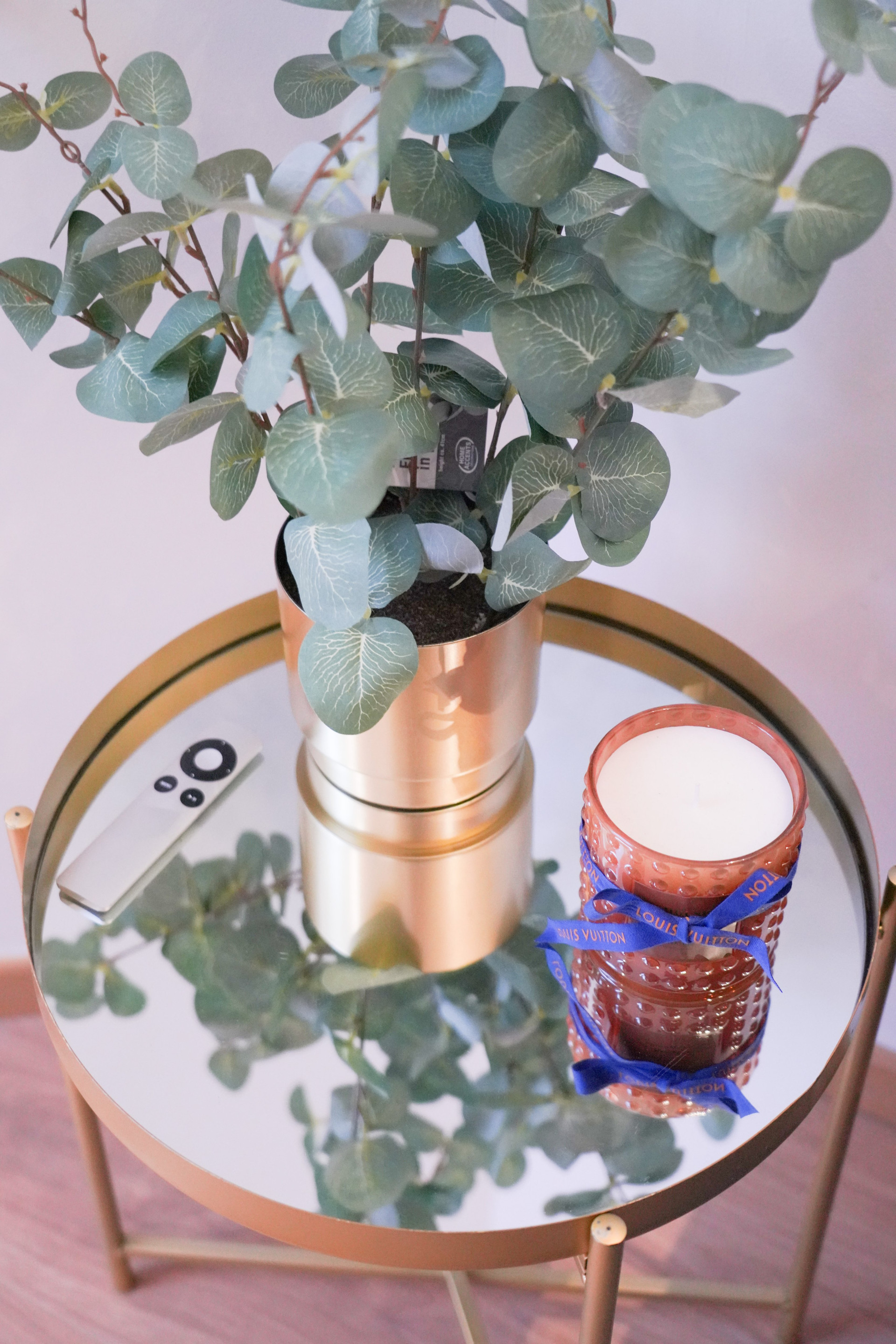 Gold side table with decor