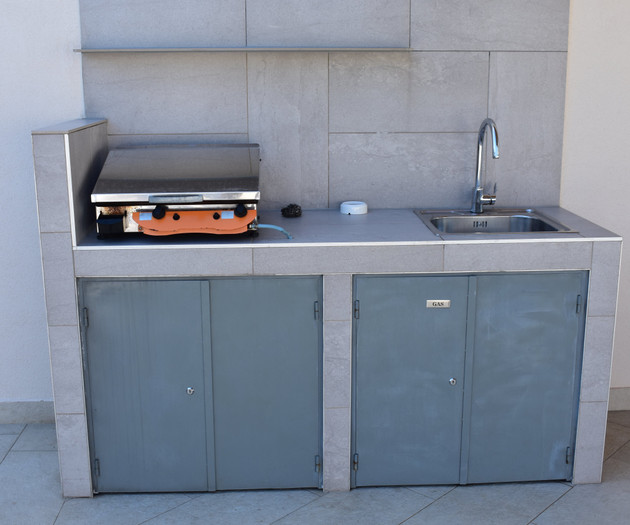 Outdoor kitchen with sink