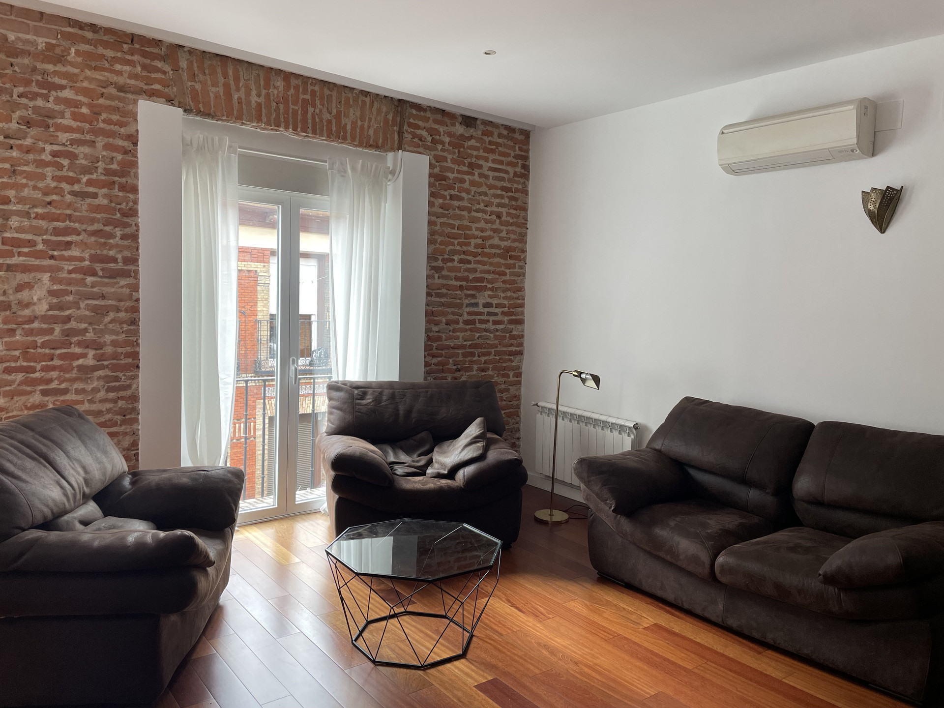 Living room brick wall balcony view