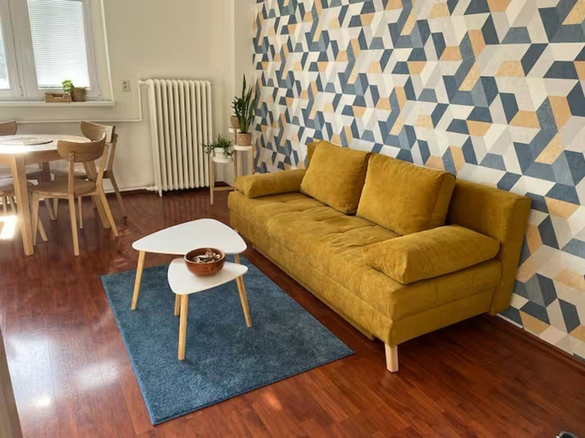 Living room with yellow sofa