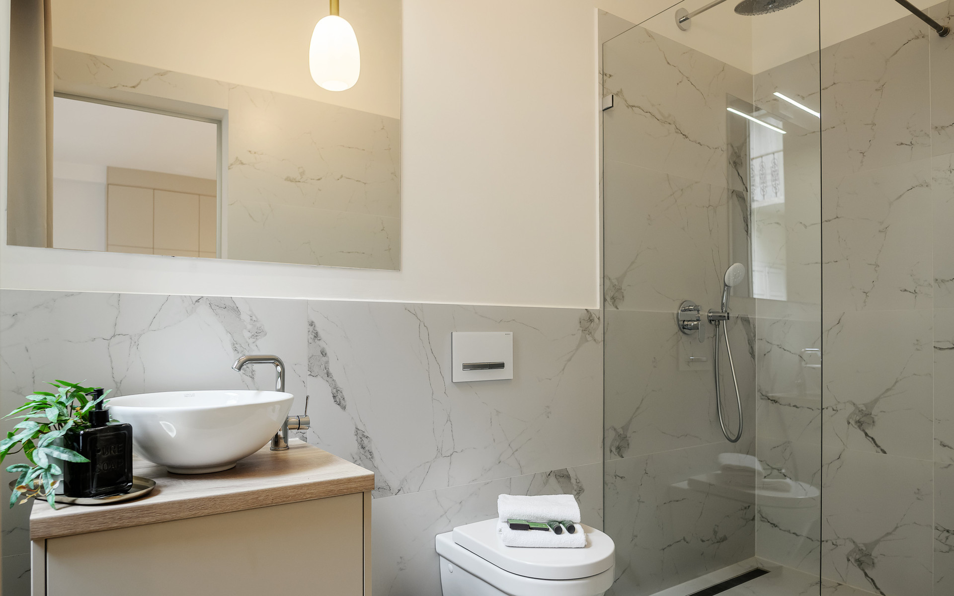 Marble bathroom with glass shower