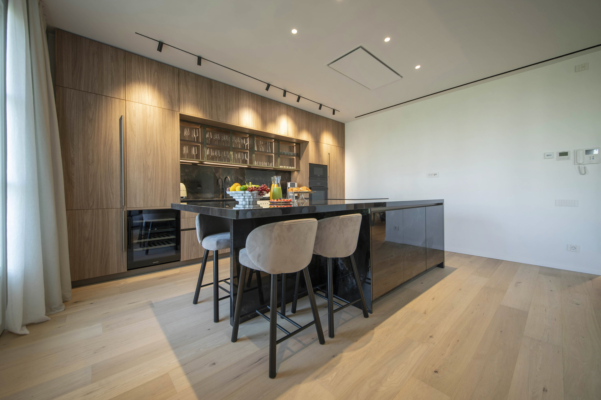 Kitchen island with bar stools