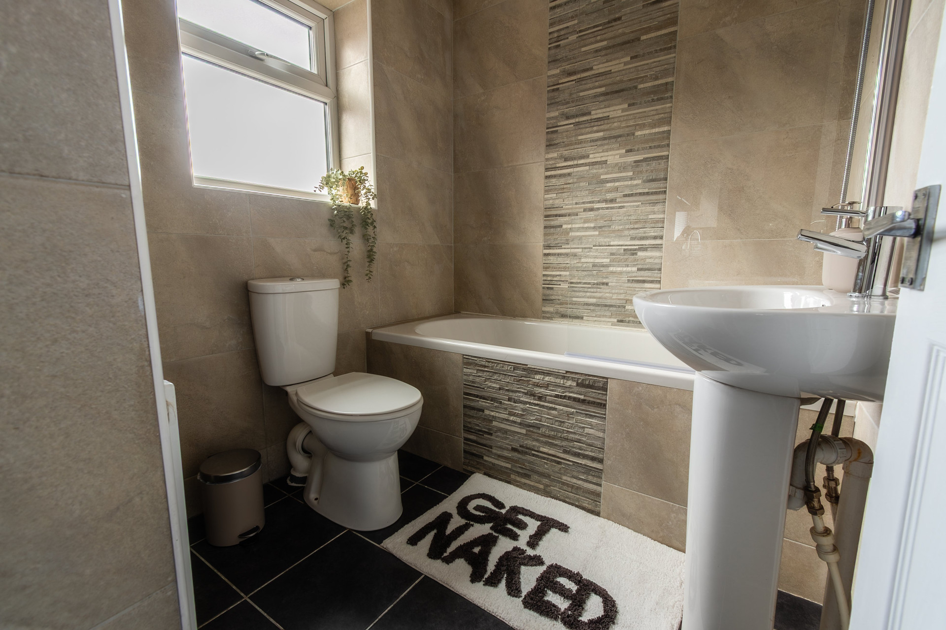 Bathroom with tub and sink
